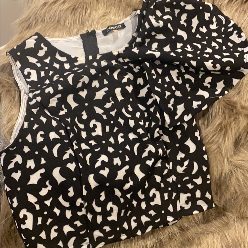 Cute short top with ruffled left arm